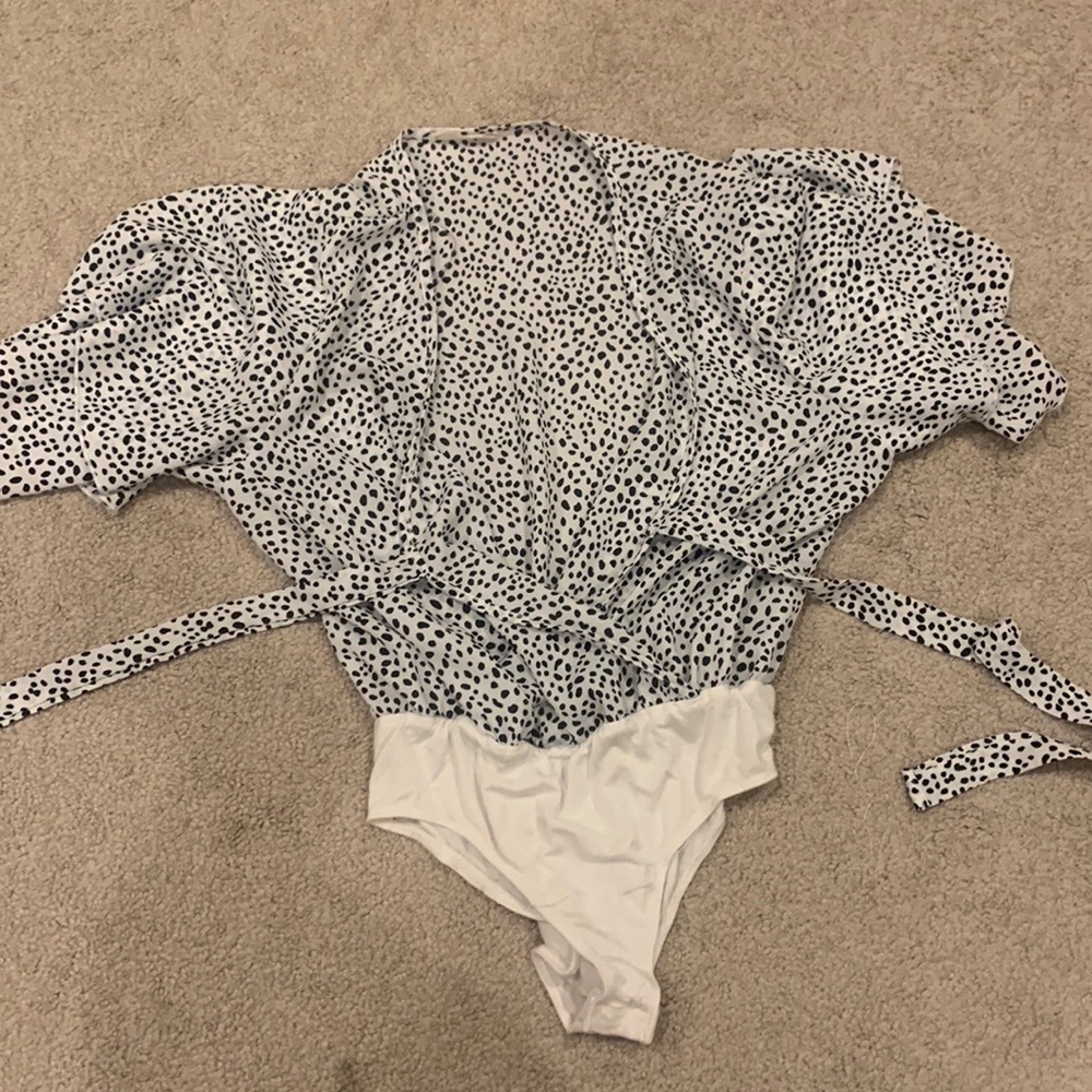 Never worn black & white altard state body suit. Size MEDIUM